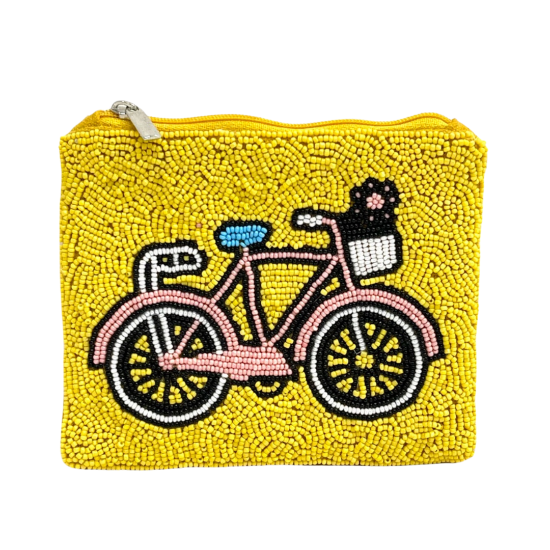 Yellow beaded pouch with a pink bicycle design on a white background