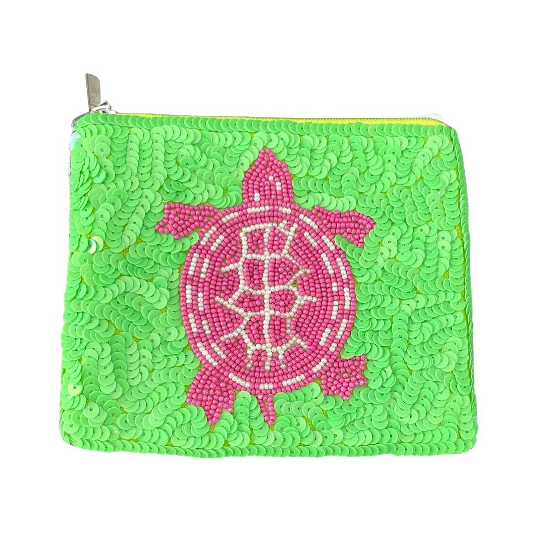 Green sequin pouch with a pink beaded turtle design on a white background