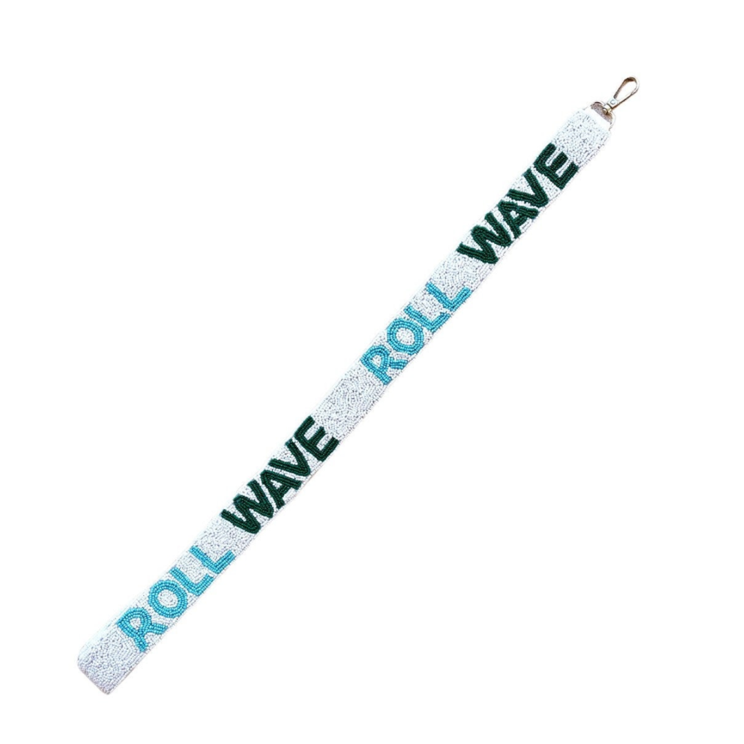 Glittery strap with 'Roll Wave' text on a white background