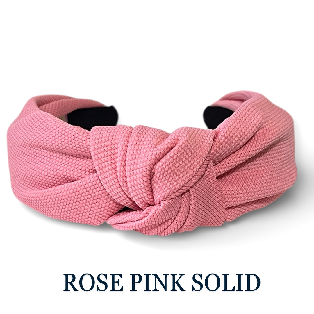 Rose pink headband on a white background with 'ROSE PINK SOLID' text.