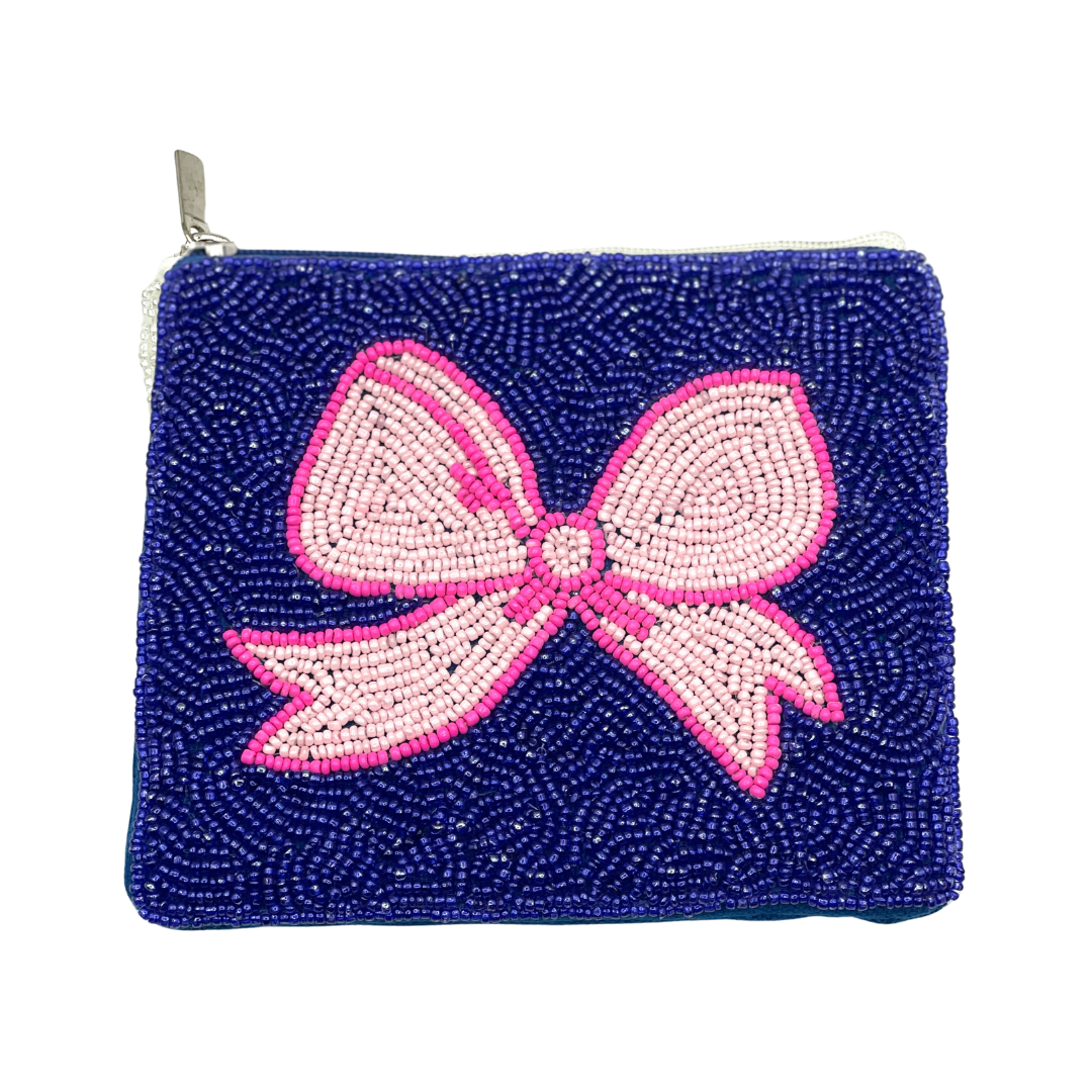 Navy blue pouch with a pink bow design on a white background
