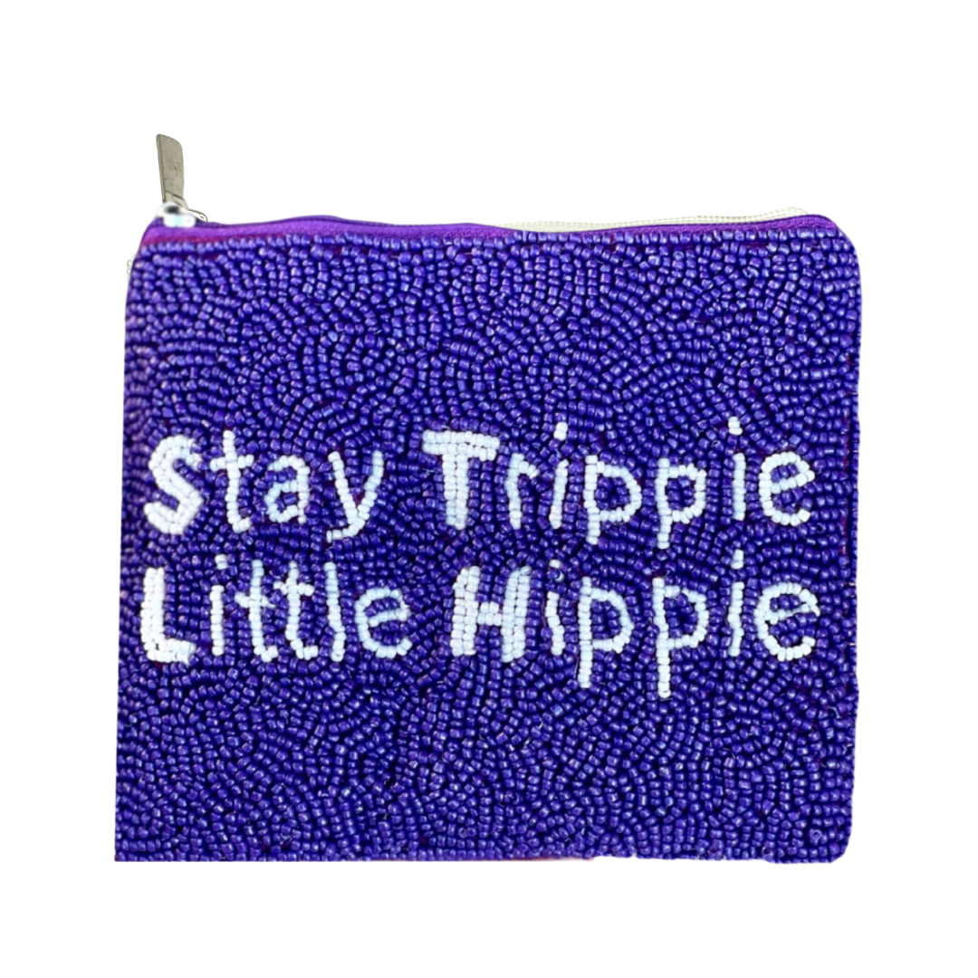 Purple beaded pouch with 'Stay Trippie Little Hippie' text on a white background