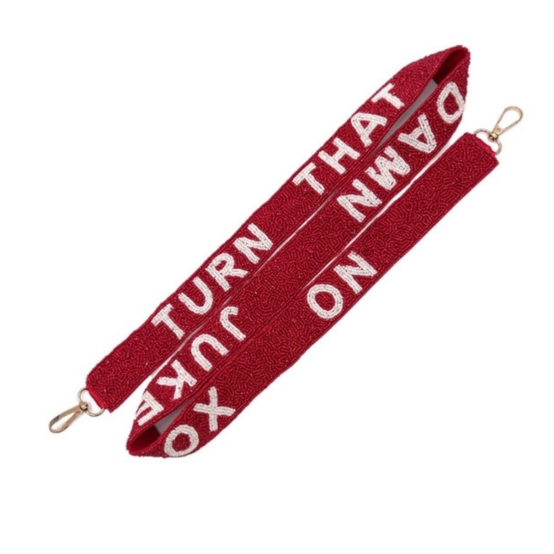 Red lanyard with white text on a white background