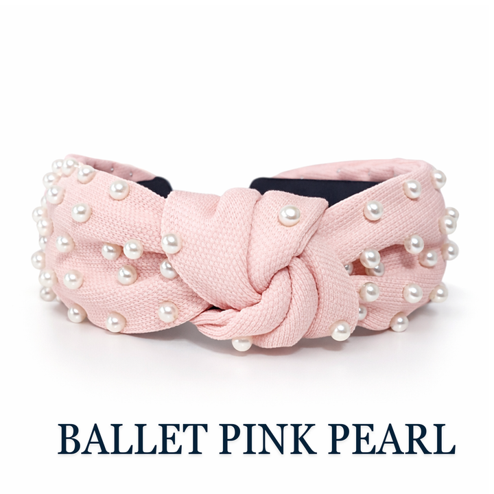 Pink headband with pearls on a white background