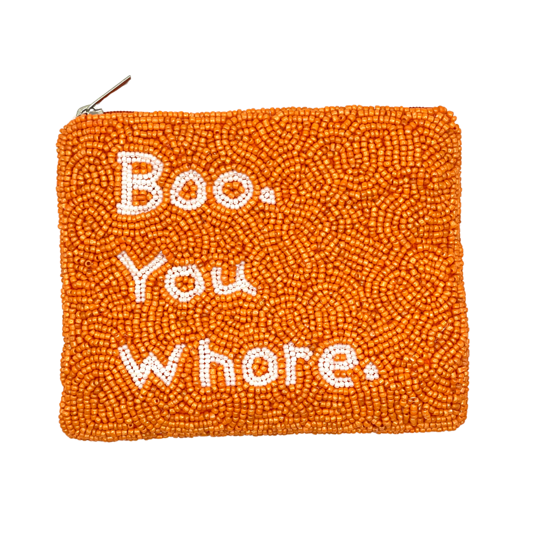 Orange beaded pouch with white text on a white background