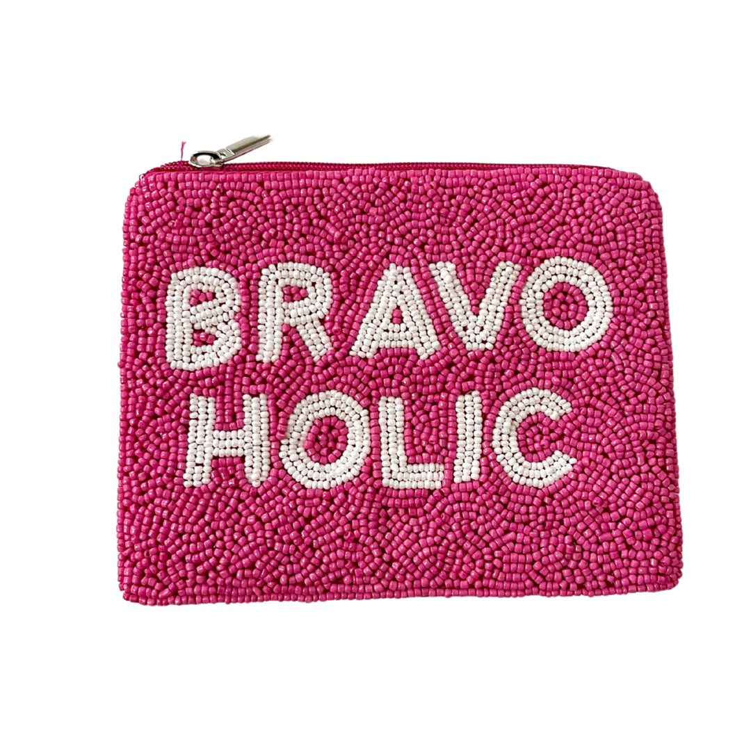 Pink pouch with 'BRAVOHOLIC' text in white letters