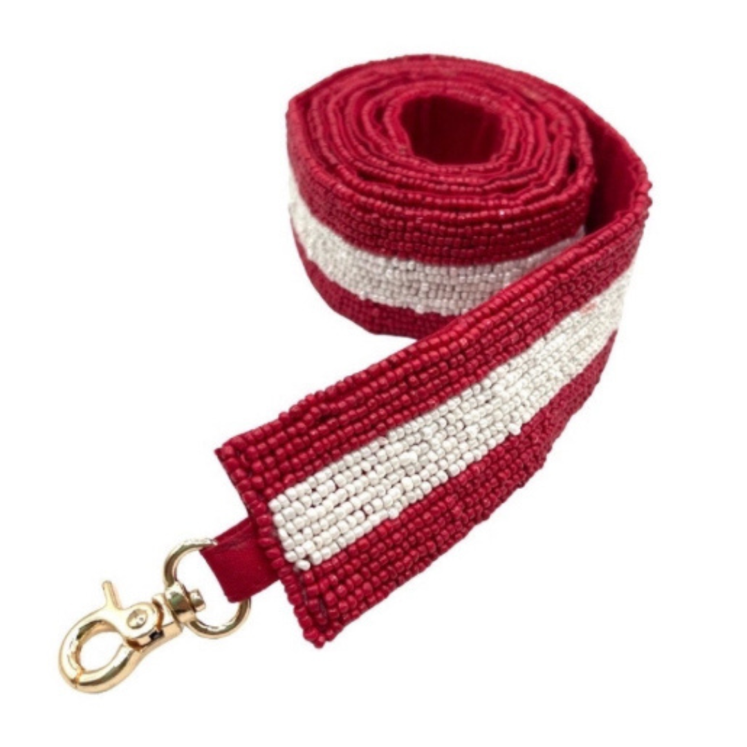 Red and white striped strap with a gold clasp on a white background