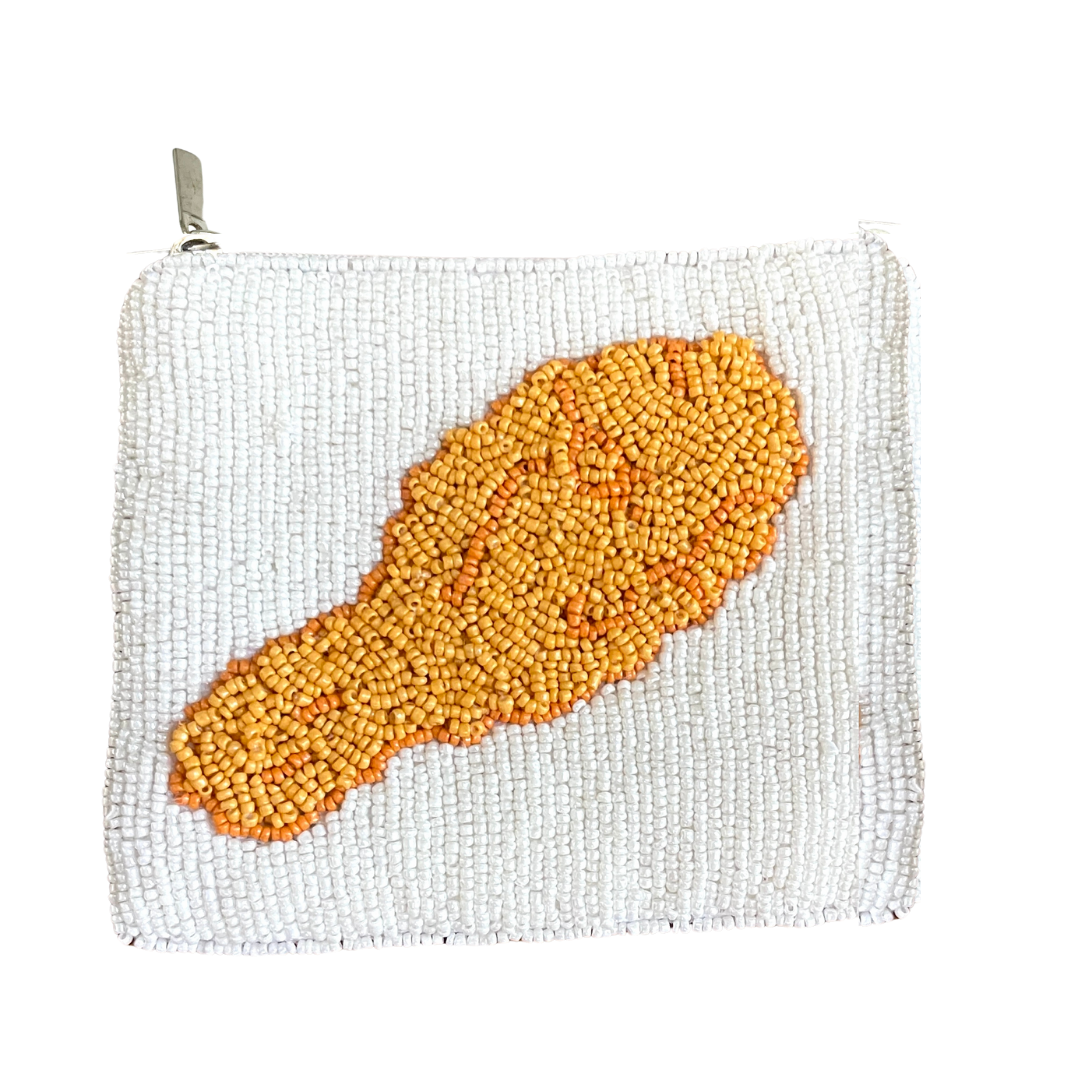 White mesh bag with a yellow beaded chicken leg design on a white background