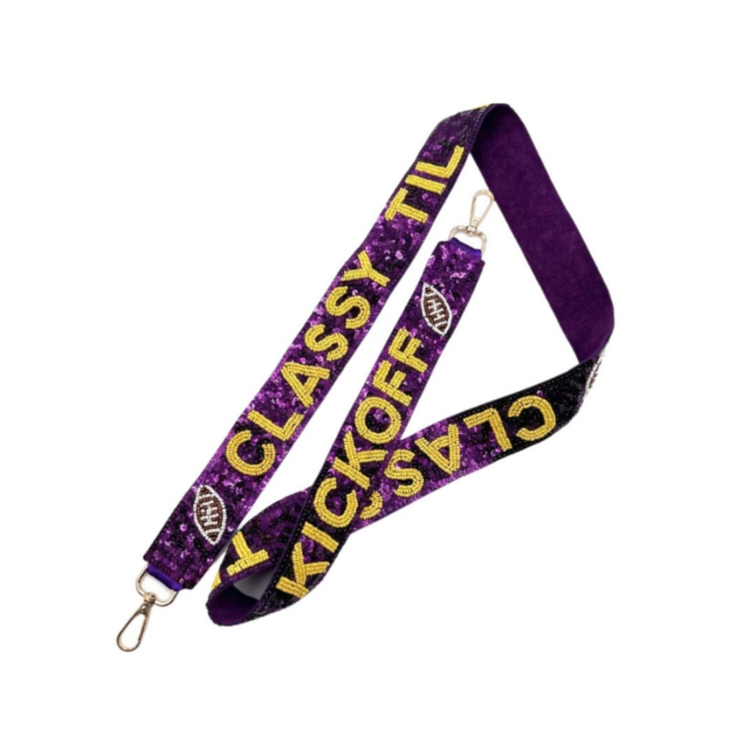 Purple lanyard with gold text on a white background