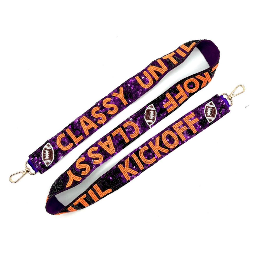 Purple and orange lanyard with text on a white background