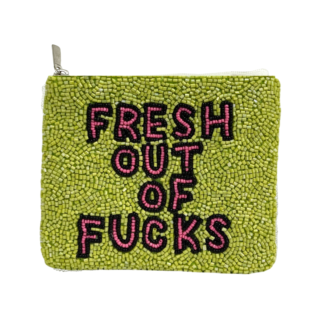 Green beaded pouch with pink text on a white background