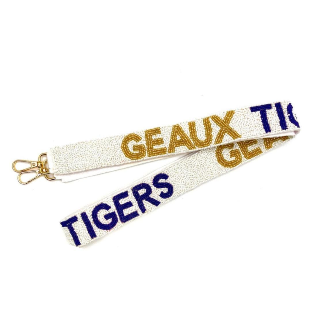 Glittery strap with 'GEAUX TIGERS' text on a white background