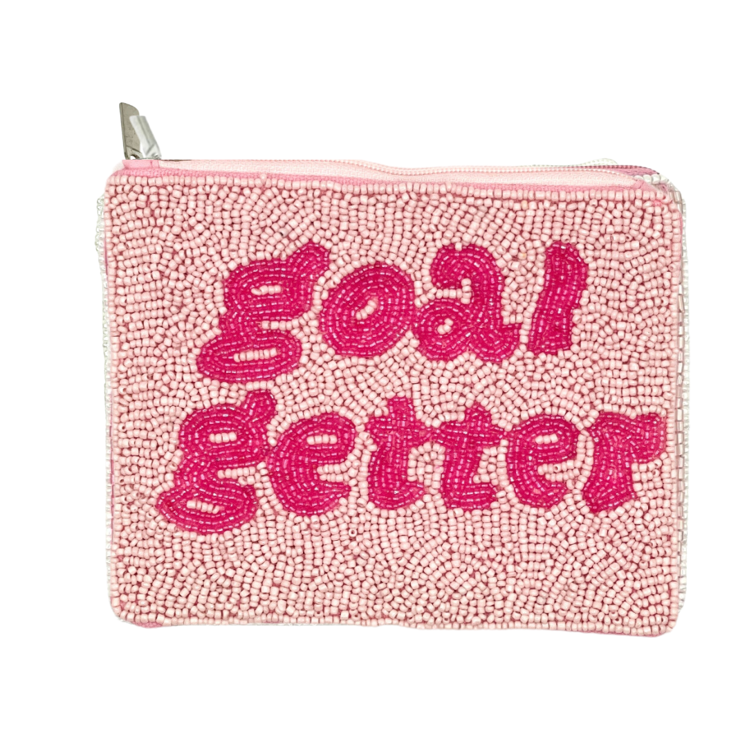 Pink textured pouch with 'goal getter' text on a white background