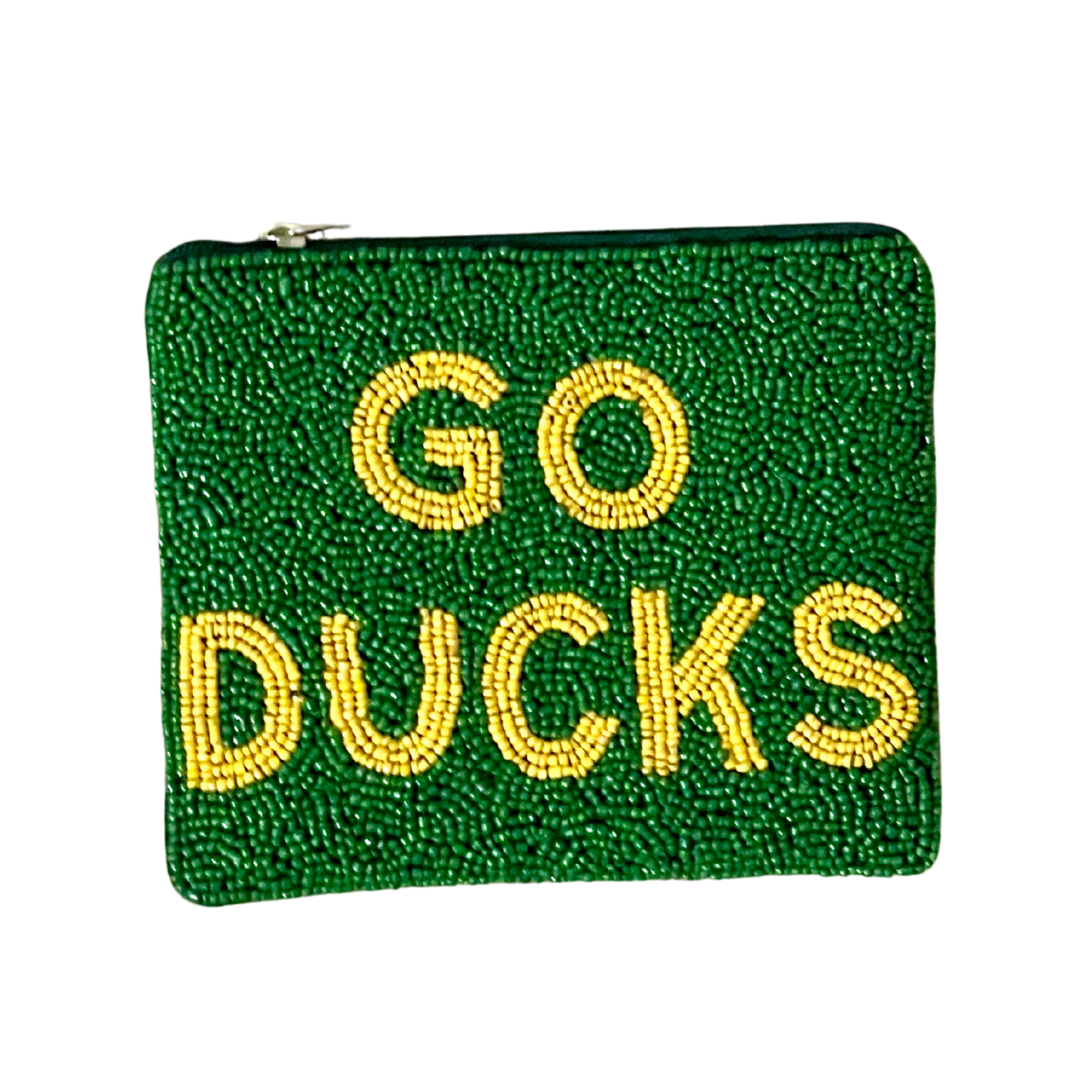 Green pouch with 'GO DUCKS' text in yellow beads on a white background