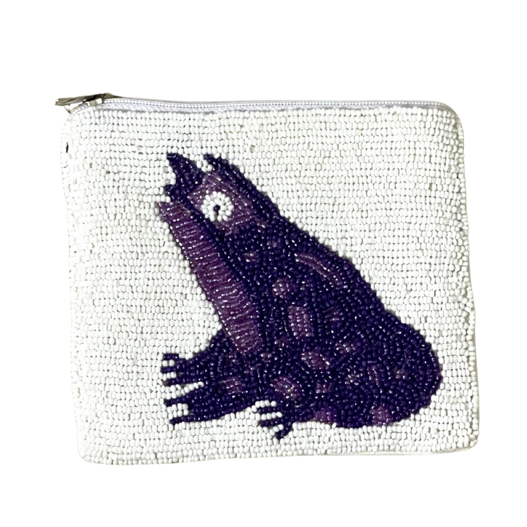 Small pouch with a purple beaded fish design on a white background