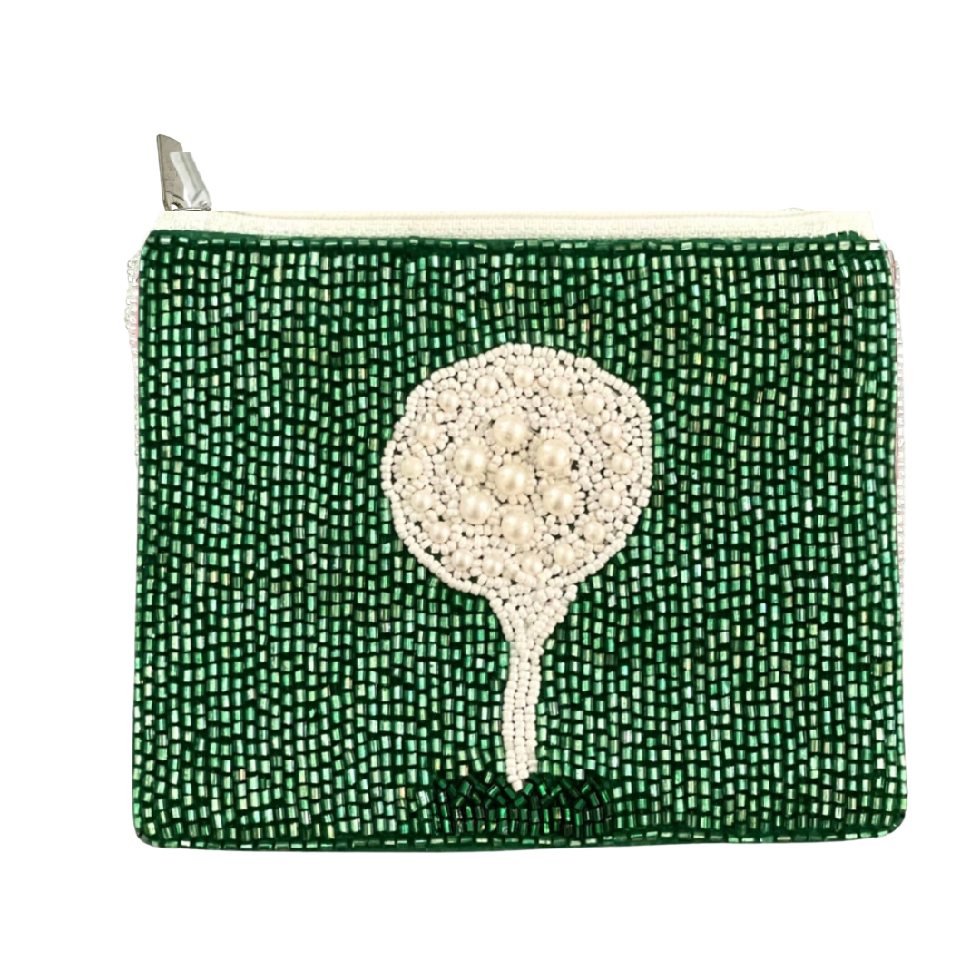 Green beaded clutch with a white floral design on a white background
