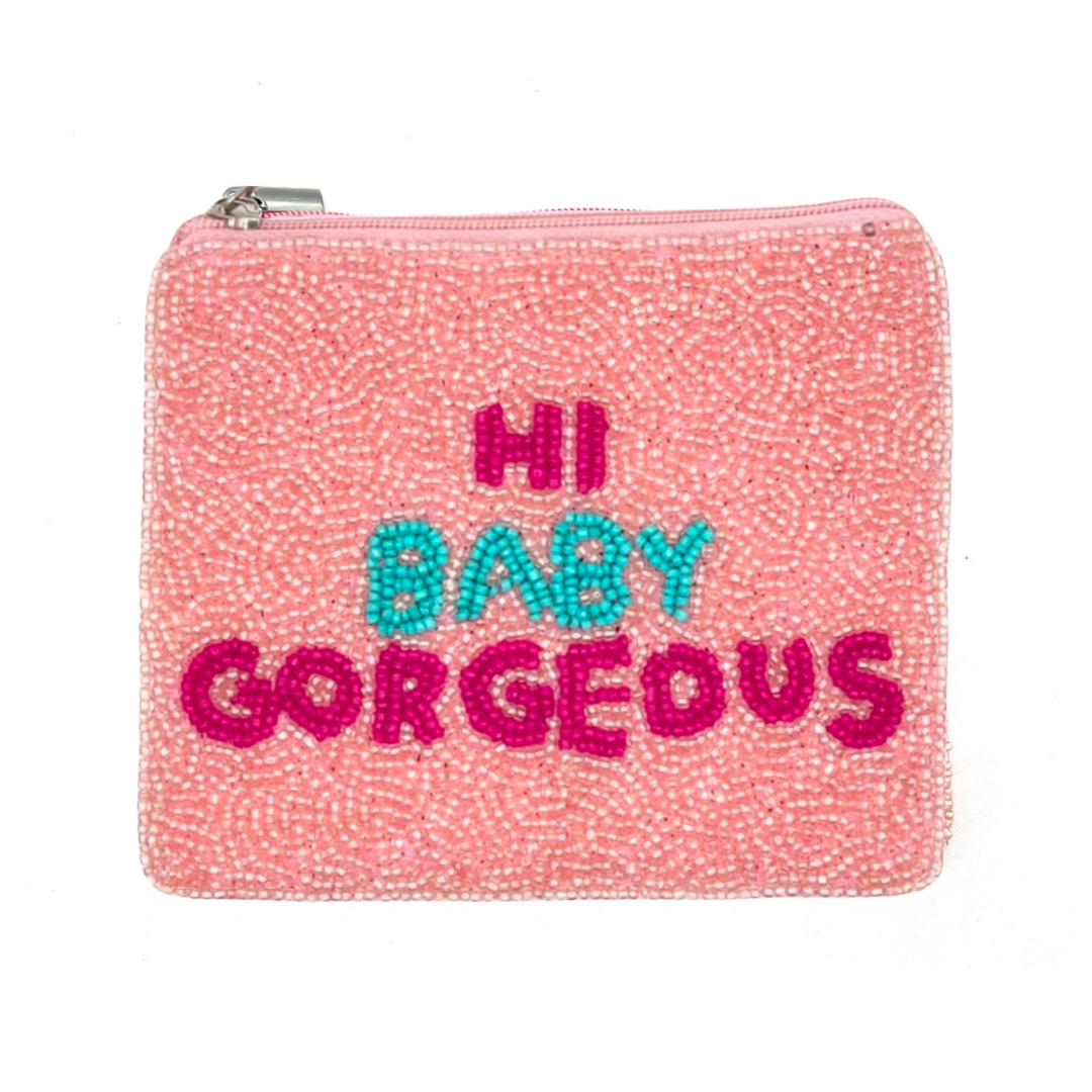 Pink beaded pouch with 'Hi Baby Gorgeous' text on a white background