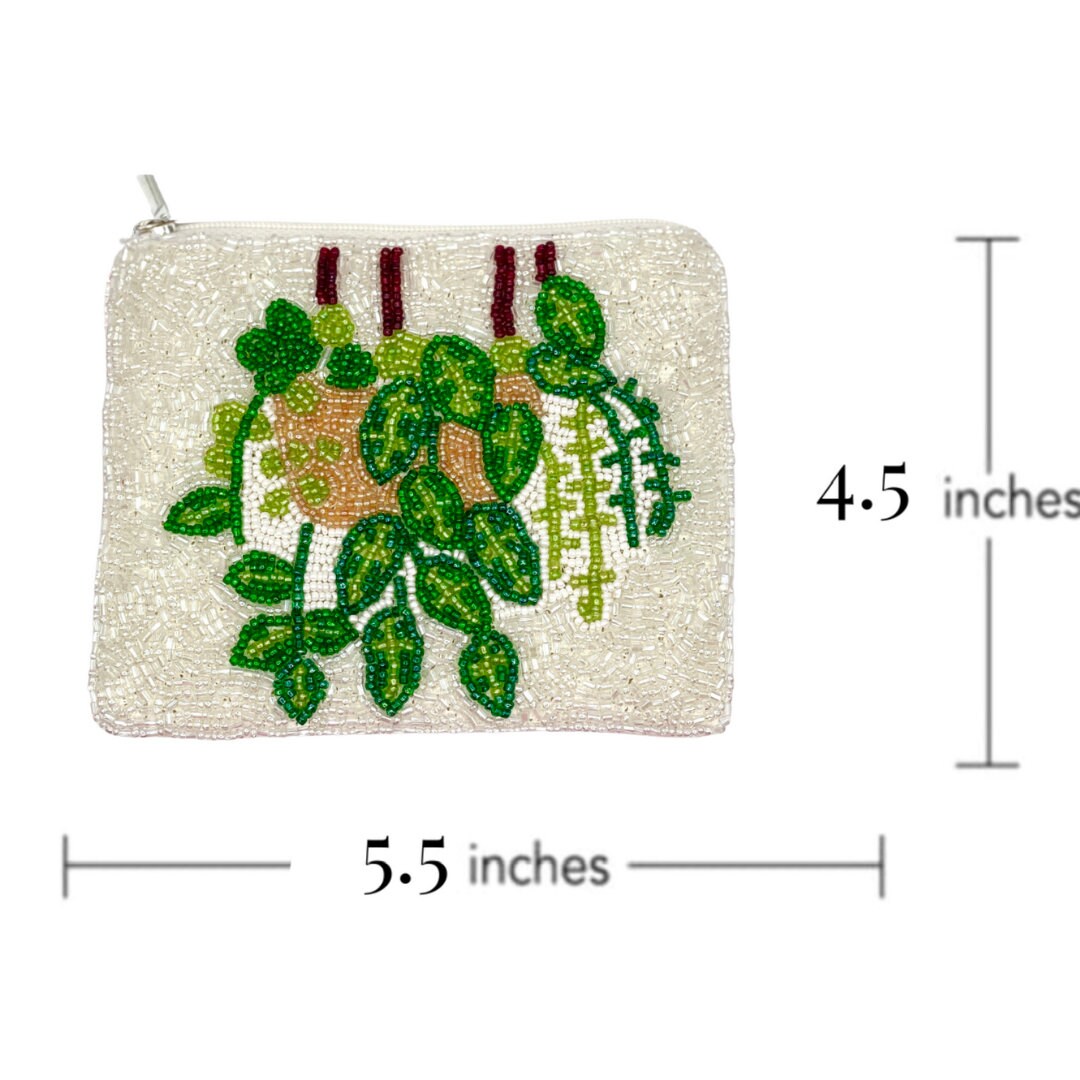 Small pouch with plant design and measurements on a white background