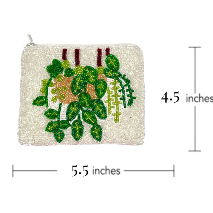 Small pouch with plant design and measurements on a white background