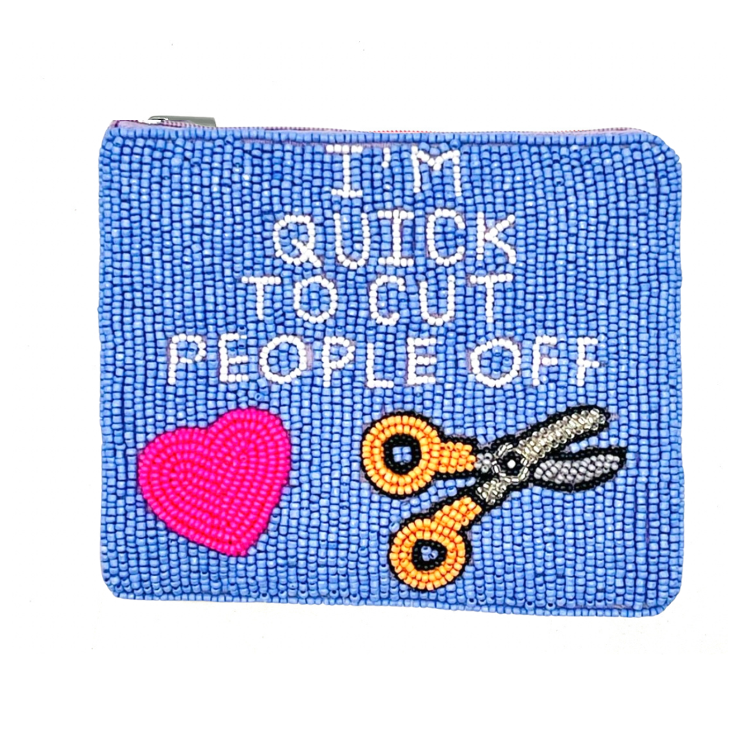 Blue beaded pouch with text 'I'm quick to cut people off' and a heart and scissors design.