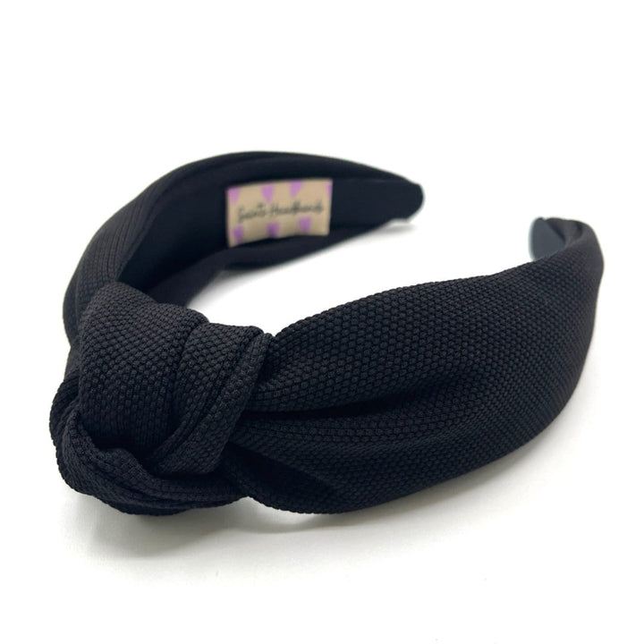 Black Knotted Headband — front view of padded top-knot design by Saints Headbands
