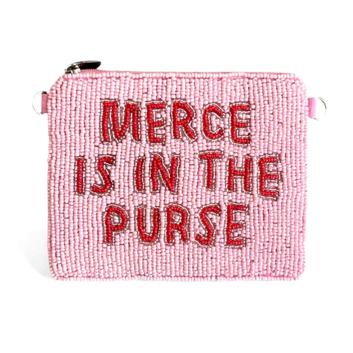 Pink beaded purse with 'Merce is in the purse' text on a white background
