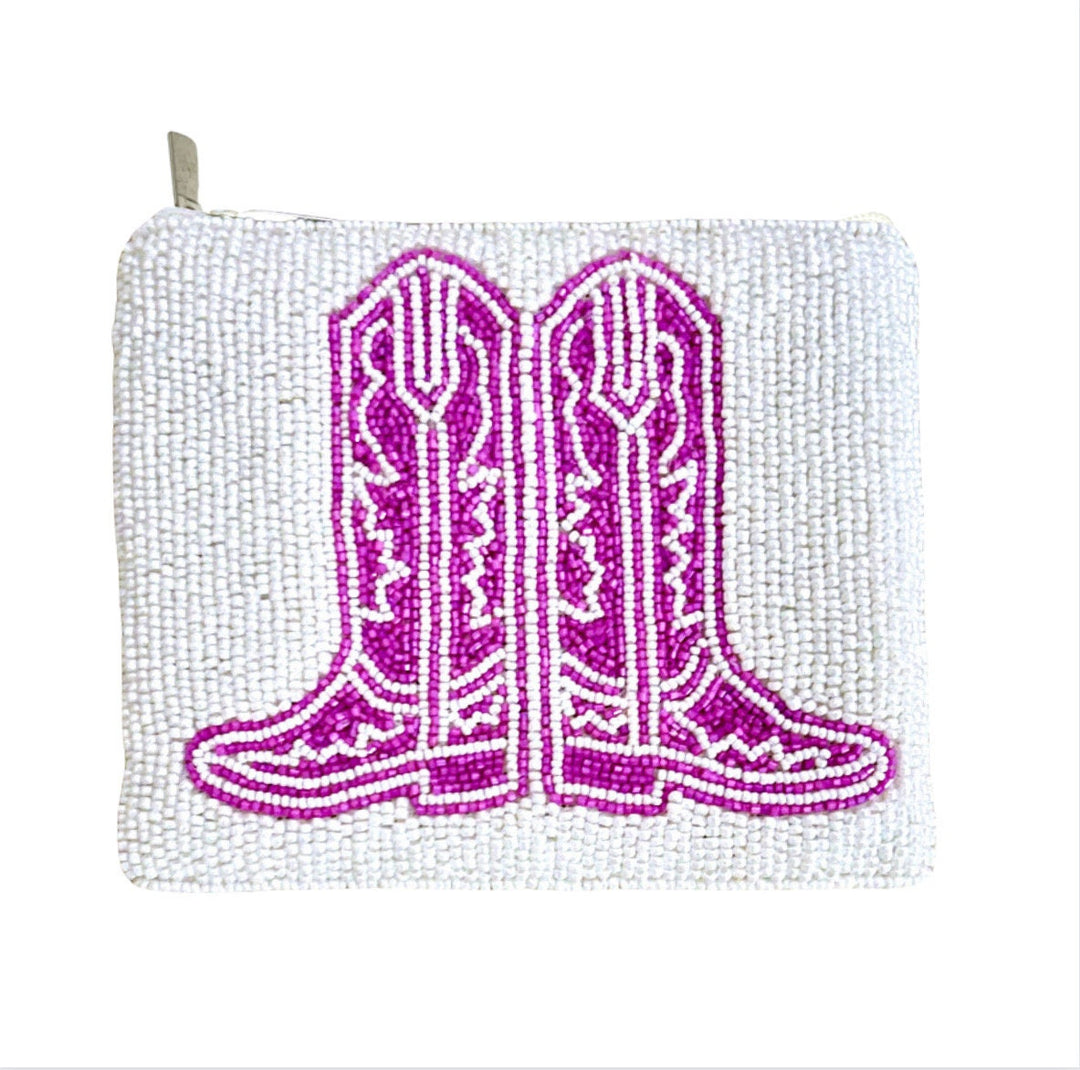 A pink beaded coin purse featuring a cowboy boot design, with a zipper closure and a canvas backing.
