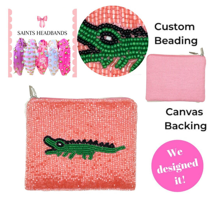Pink pouch with green alligator design, Saints headbands, and beaded product on a white background