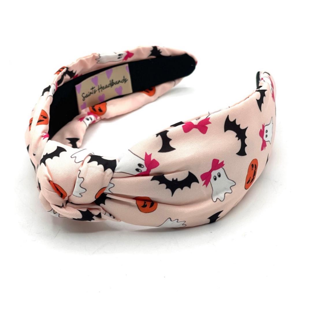Headband with Halloween-themed design on a white background