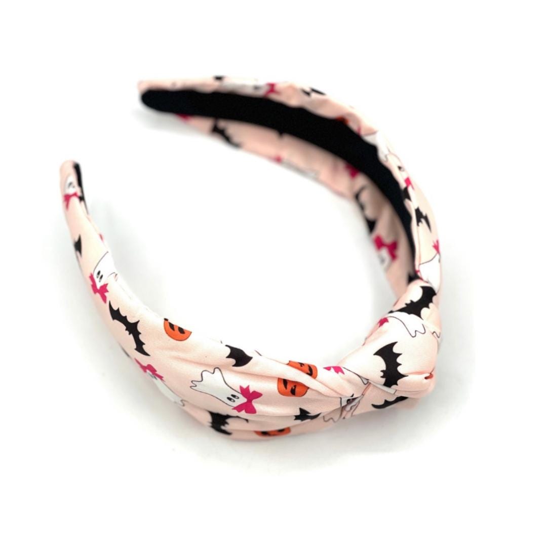 Headband with cat pattern on a white background