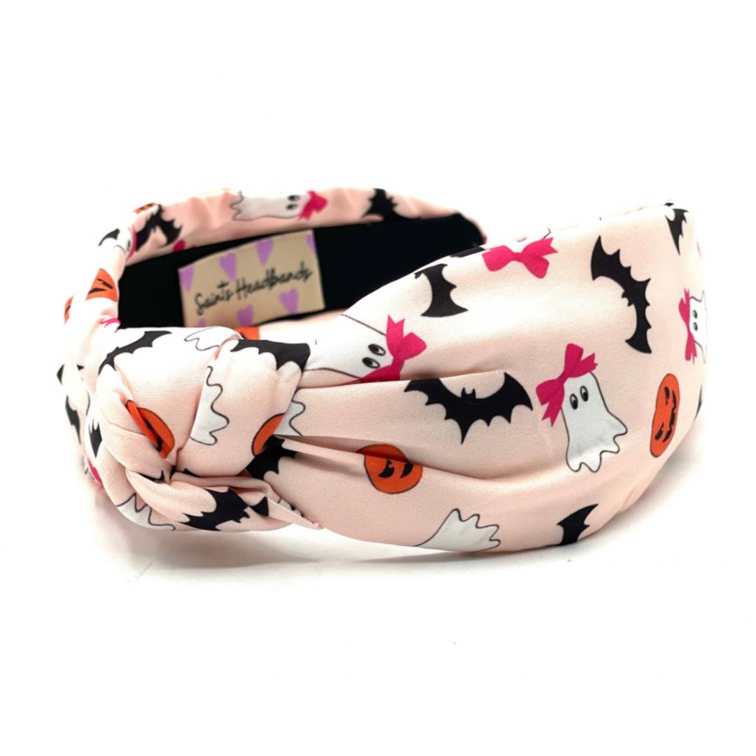 Headband with Halloween-themed pattern on a white background