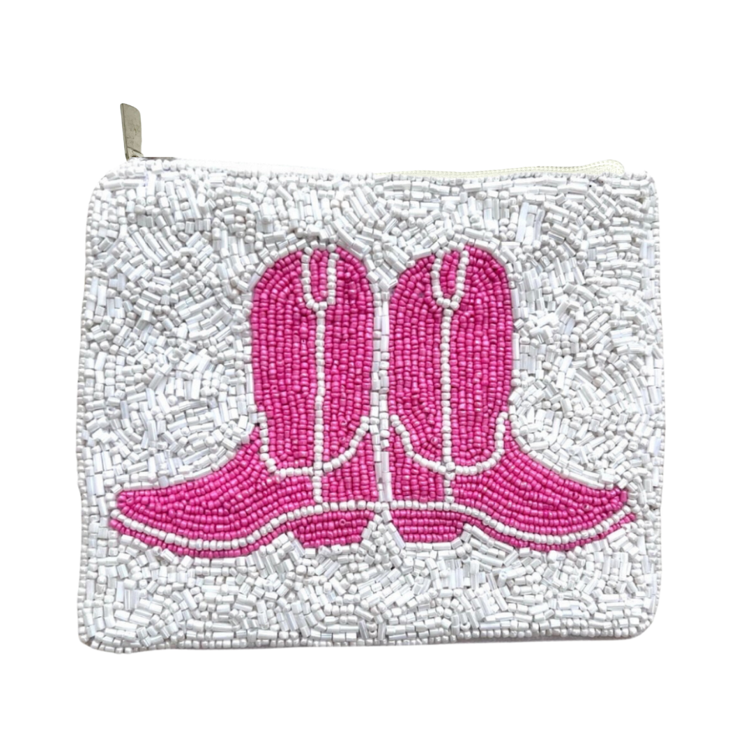 Beaded clutch with pink cowboy boots design on a white background