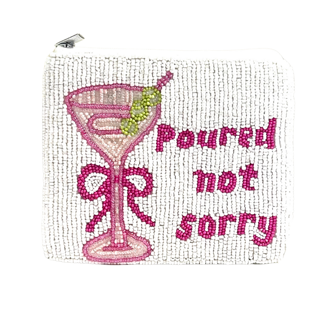 Beaded pouch with a martini glass design and 'Poured not sorry' text on a white background