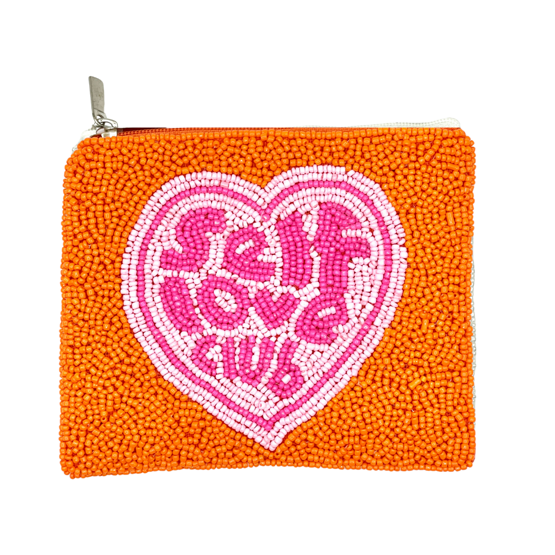 Orange beaded pouch with pink heart design and text on a white background
