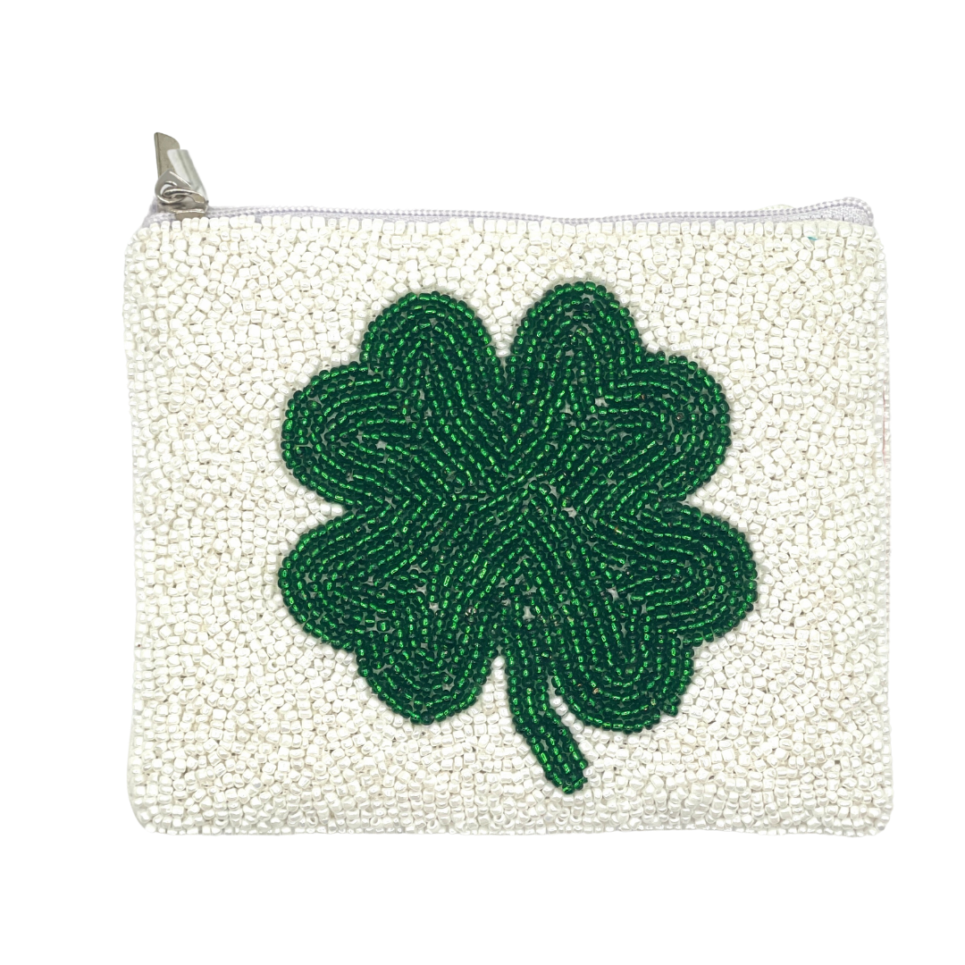 Small pouch with a green four-leaf clover design on a white background