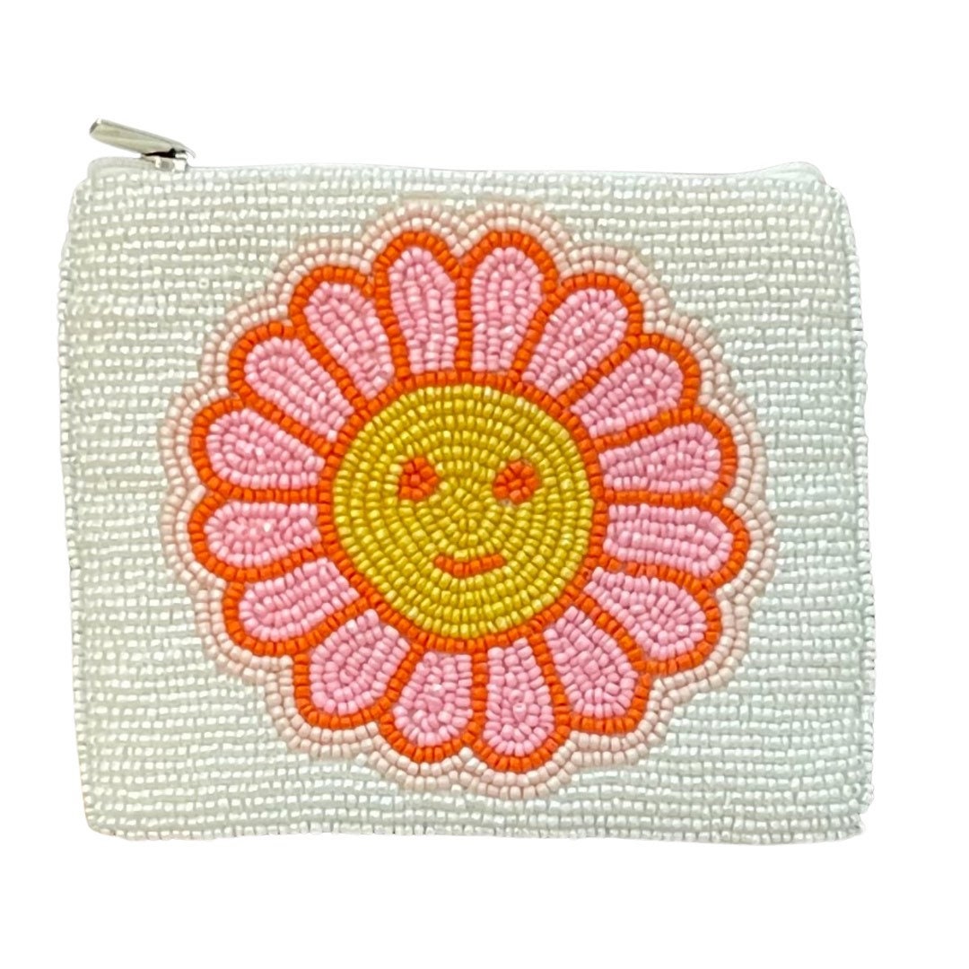 A beaded coin purse with a sunflower design, featuring orange, pink, and yellow colors, with a zipper closure at the top.