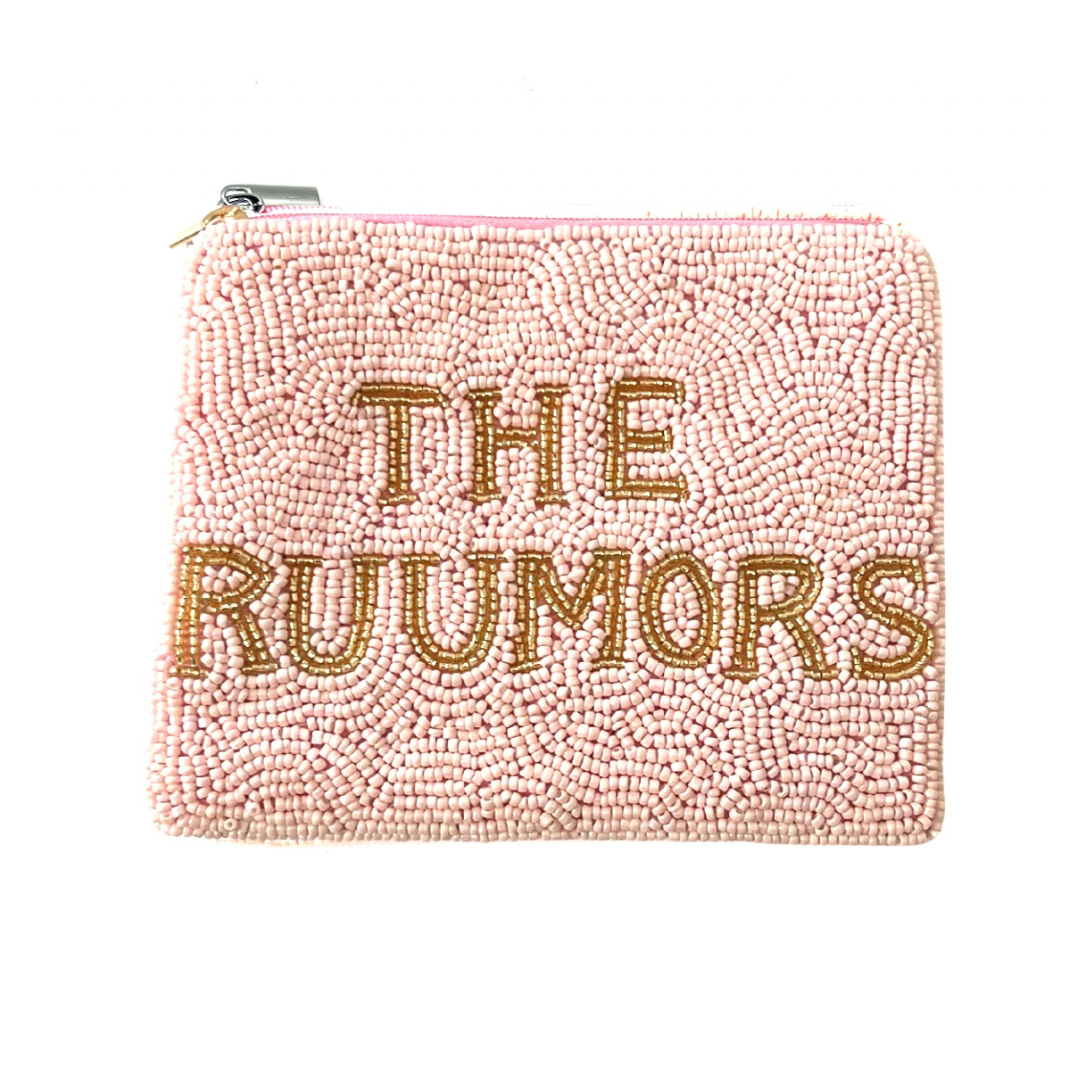 Pink beaded pouch with 'THE RUUMORS' text on a white background