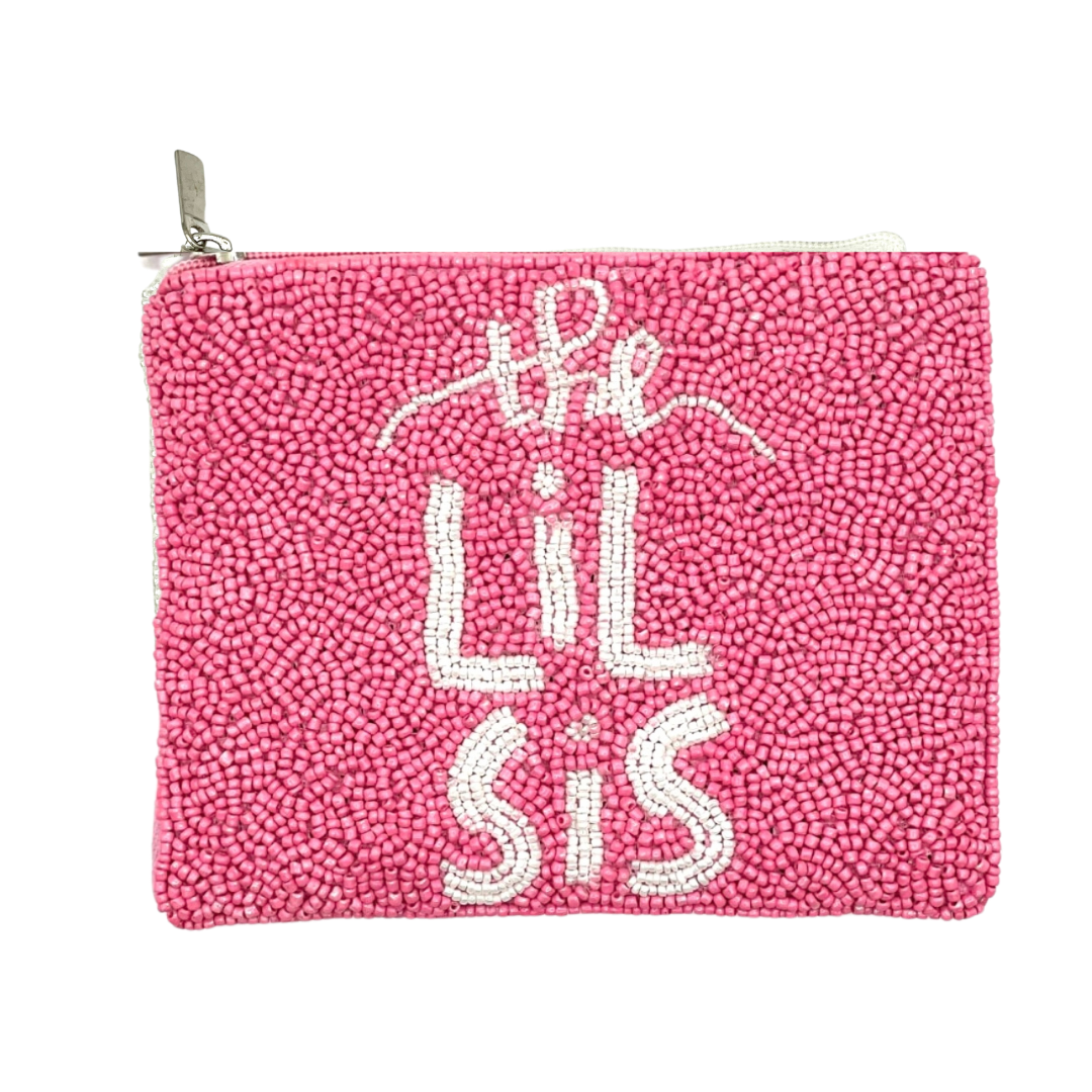 Pink textured pouch with 'the lil sis' text on a white background