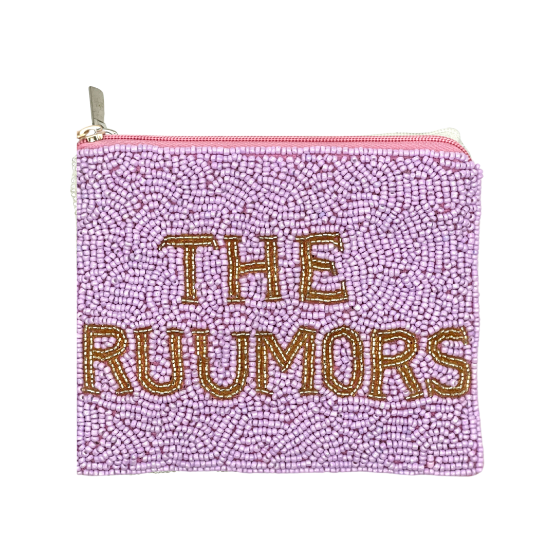 Pink beaded pouch with 'THE RUUMORS' text on a white background