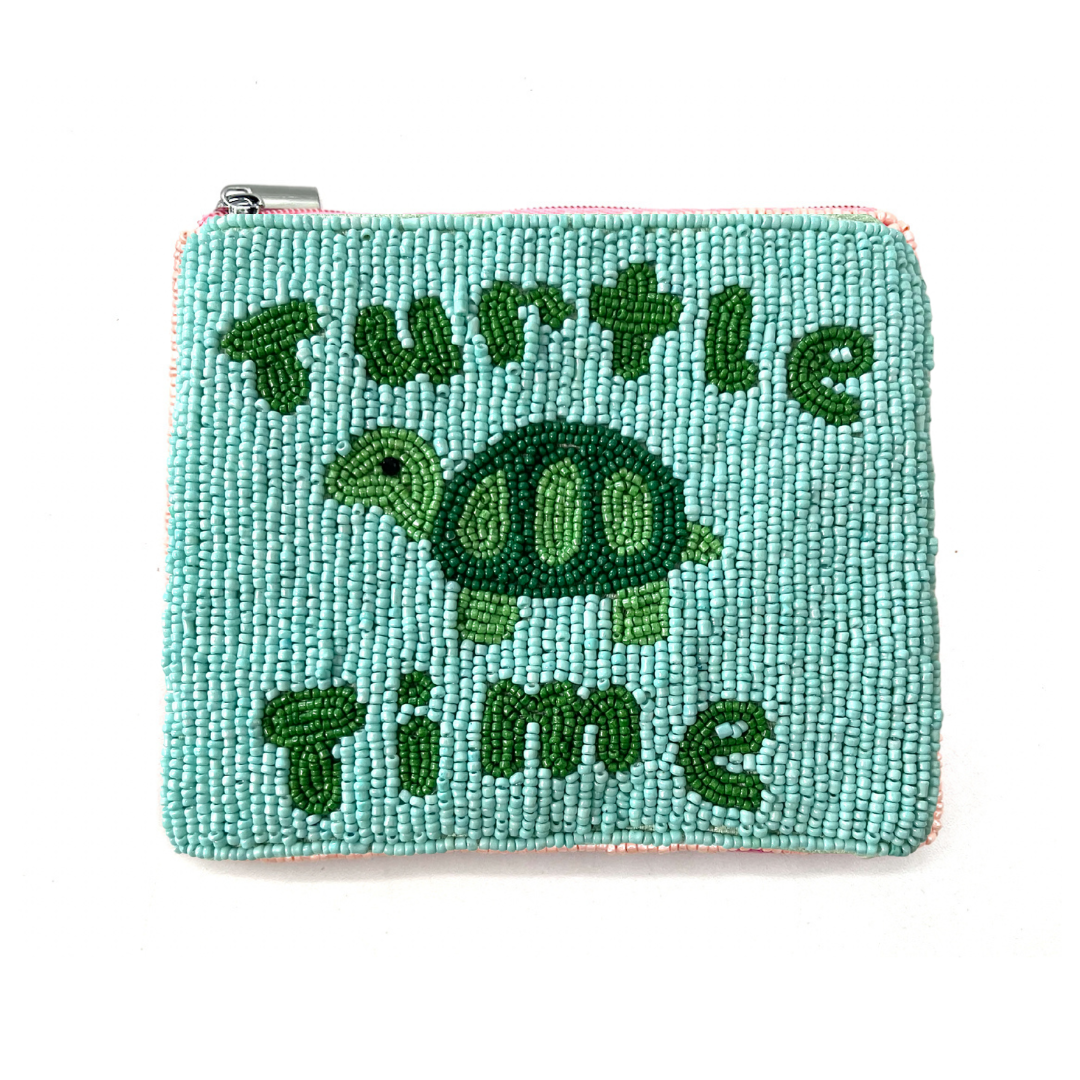 Teal pouch with turtle design and 'Turtle Time' text on a white background