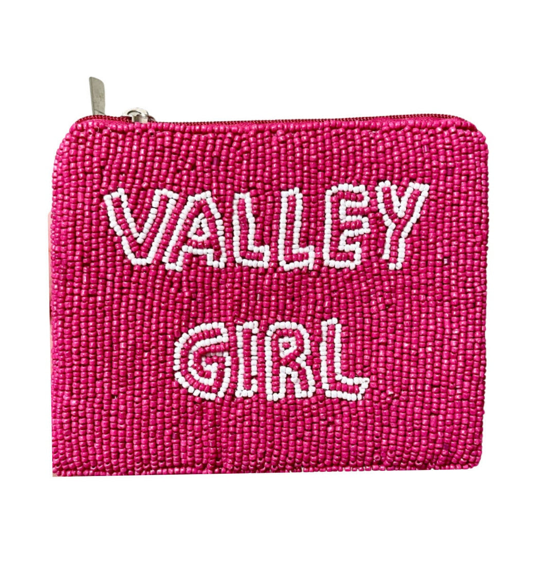 pink beaded coin pouch with white lettering that says valley girl.