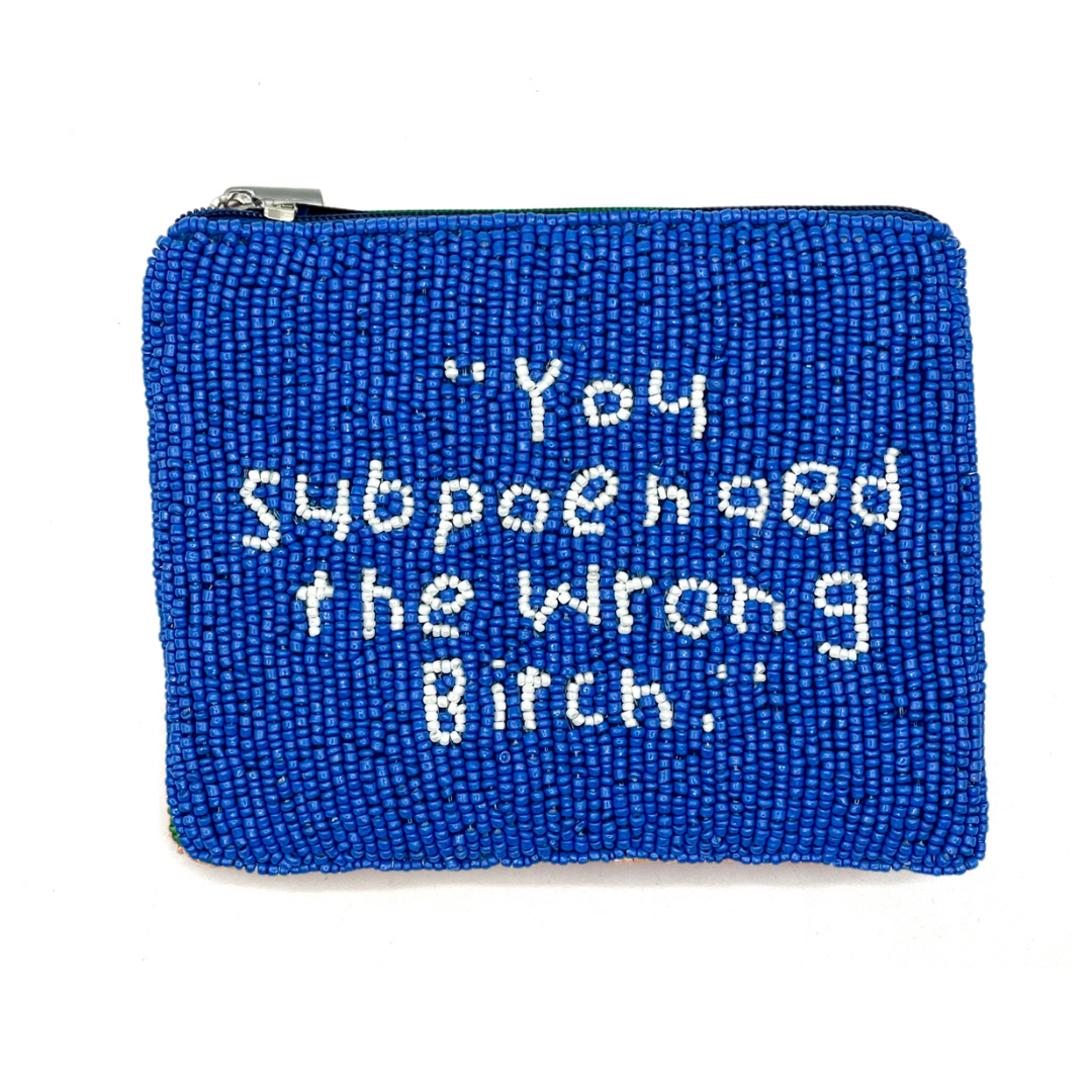 Blue beaded pouch with white text on a white background
