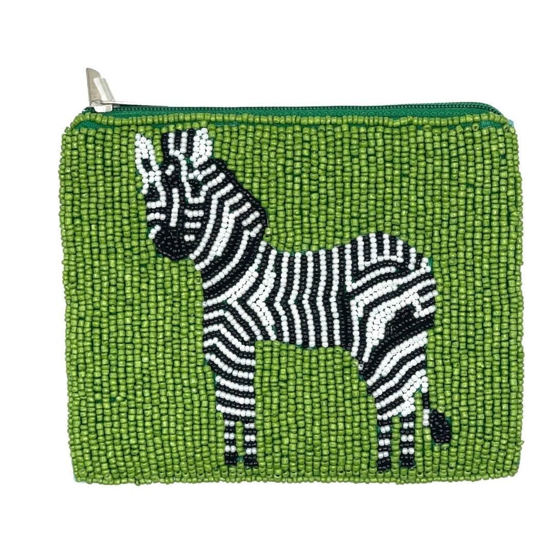 A small, green beaded coin purse featuring a hand-sewn zebra design with a black and white color scheme.